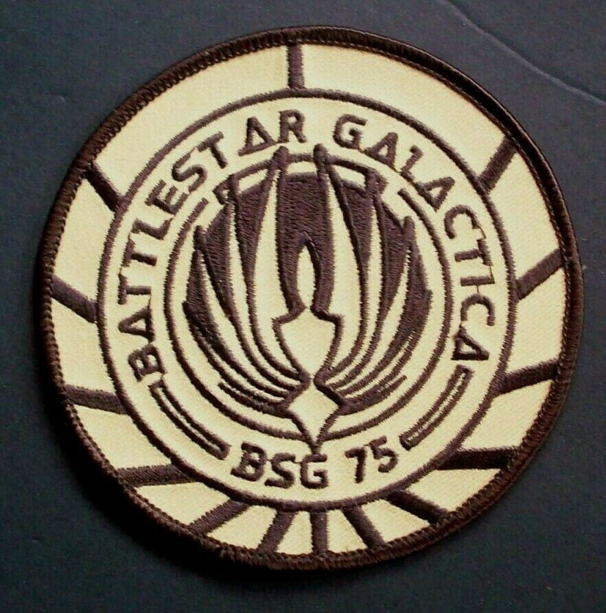 3 7/8 inches in diameter, BSG 75 embroidered patch similar to that worn of the uniforms of the second Battlestar Galactica sci-fi series. Sew or iron on. New.

Please note we will always combine shipping on like items. Any additional patch or pin will ship for 50 cent per item. Any additional payment will be reimbursed to your Paypal account. Thank You.