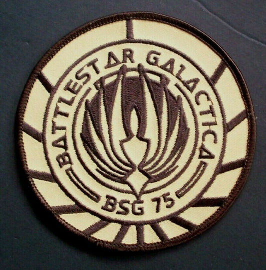 3 7/8 inches in diameter, BSG 75 embroidered patch similar to that worn of the uniforms of the second Battlestar Galactica sci-fi series. Sew or iron on. New.

Please note we will always combine shipping on like items. Any additional patch or pin will ship for 50 cent per item. Any additional payment will be reimbursed to your Paypal account. Thank You.
