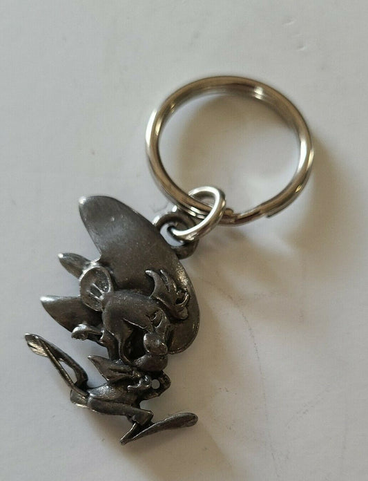 A new Looney Tunes Speedy Gonzales Pewter Embossed  Key Chain.  The ornament is 1. 1/2 inches tall but 3 inches tall overall.

Please note we will always combine shipping on like items.  Any additional patch or pin will ship for 50 cent per item.  Any additional payment will be reimbursed to your Paypal account.  Thank You.