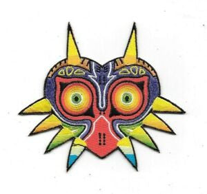 4 inches wide,  Legend of Zelda Majora's Mask logo patch. Sew or iron on. New.

Please note we will always combine shipping on like items.  Any additional patch or pin will ship for 50 cent per item.  Any additional payment will be reimbursed to your Paypal account.  Thank You.