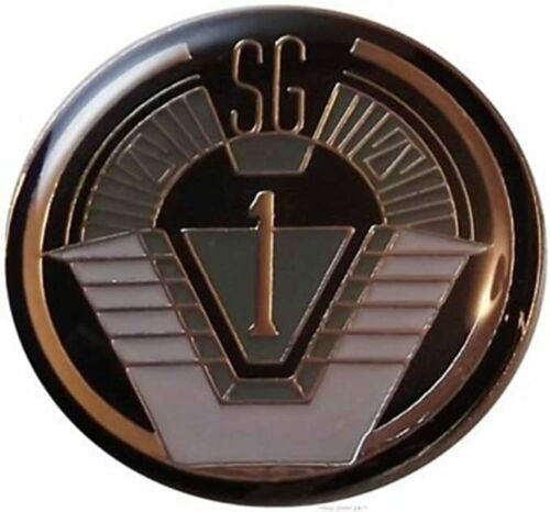 1 inches diameter.  A new Stargate SG-1 Shoulder logo enamel pin with a single post clutch back. 

Please note we will always combine shipping on like items.  Any additional patch or pin will ship for 50 cent per item.  Any additional payment will be reimbursed to your Paypal account.  Thank You.