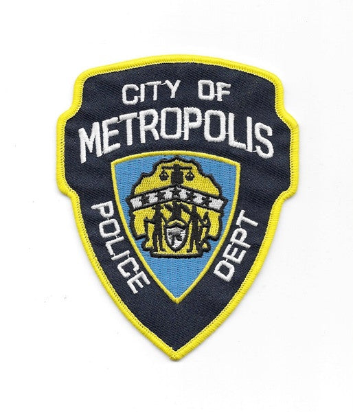 Superman City of Metropolis Police Department Logo Embroidered Patch
This mint, unused 4.5″ high patch features the logo of the City of Metropolis Police Department as seen in the Superman Returns movie.