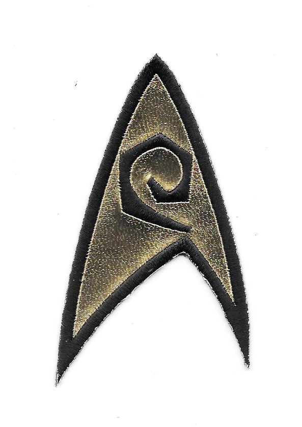 Star Trek Classic TV Series Engineering Logo Embroidered Chest Patch NEW UNUSED
This mint embroidered patch pictures the engineering chevron as seen on the episodes of the original classic Star Trek TV series. It was seen on the left breast of the shirts, as worn by Lt. Uhura and Scotty. It measures 3.5″ high and was originally made by Majel Barrett Roddenberry’s company and have always been difficult to find outside of Star Trek conventions.